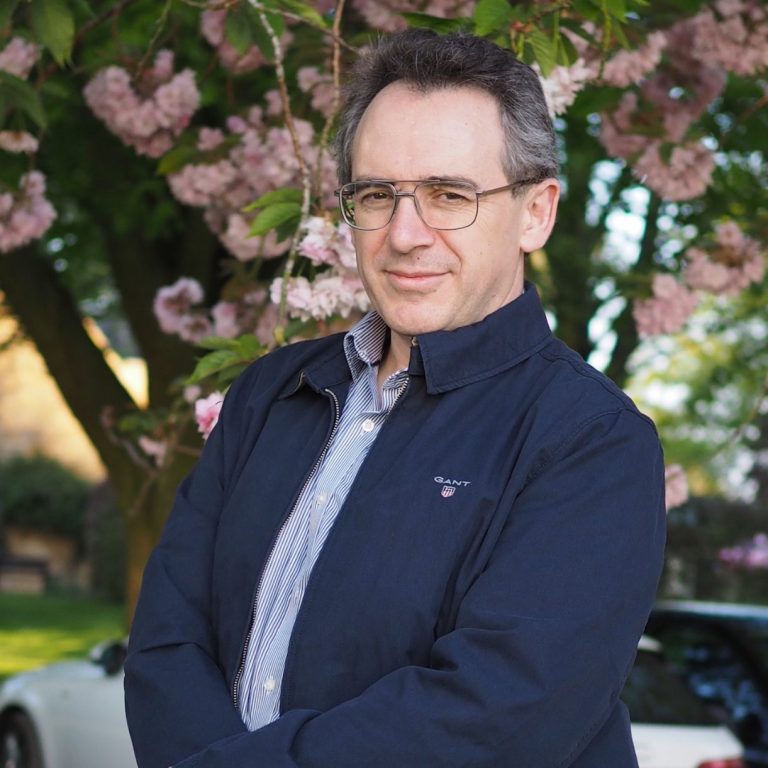 Photo of KB-Dynamics Senior Technical Consultant, Dr Robert Hercock, standing in a garden